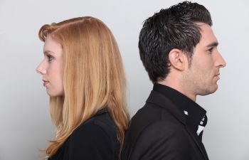 profiles of a young woman and man