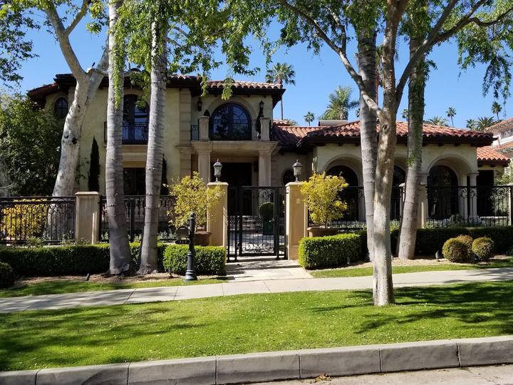 A Spanish-style home on a tree-lined street in the Beverly Hills Flats